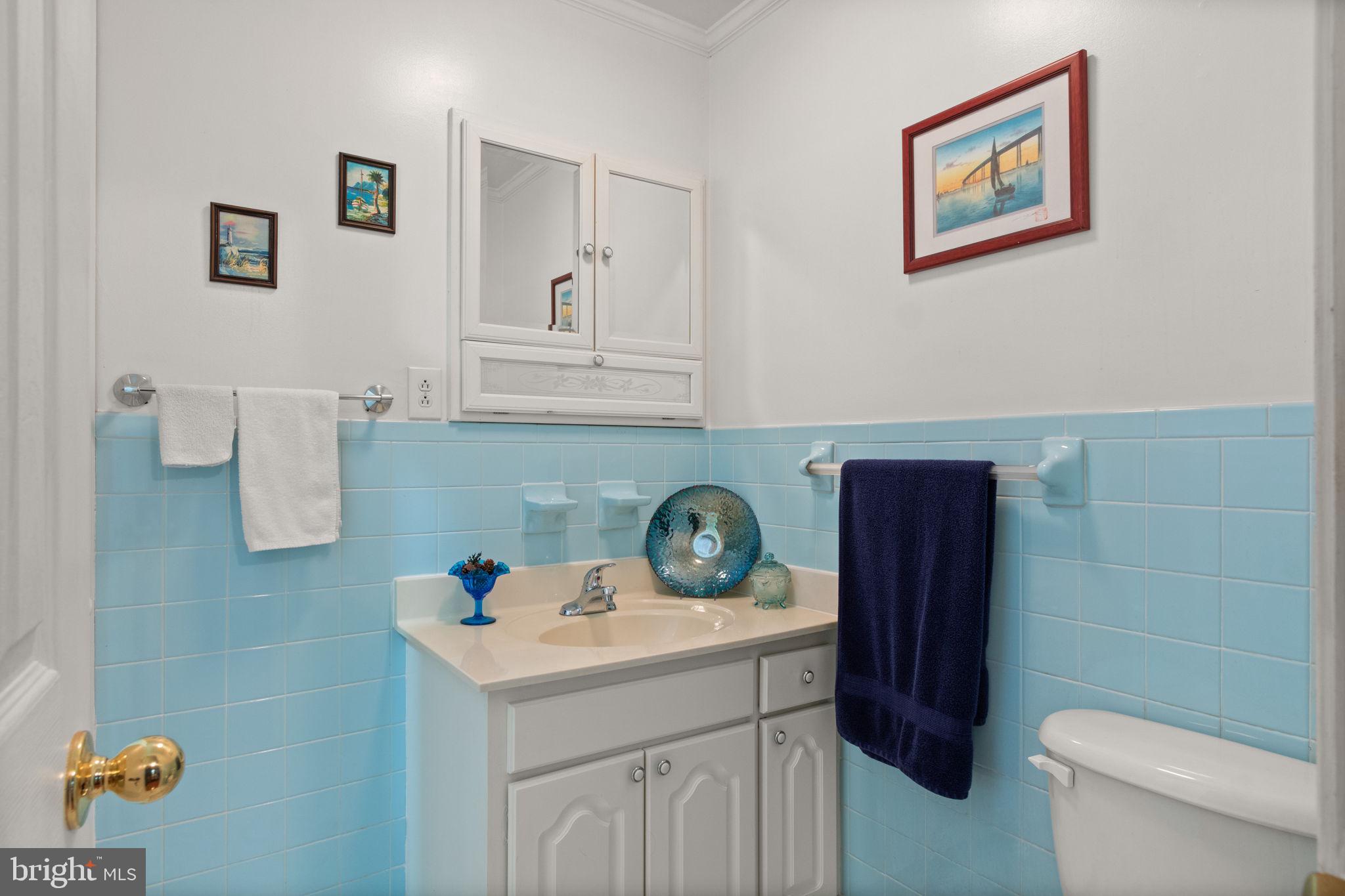 54 Richards Ferry Road Fredericksburg, VA 22406 - Photo 24 of 53 a bathroom with a sink a toilet and mirror