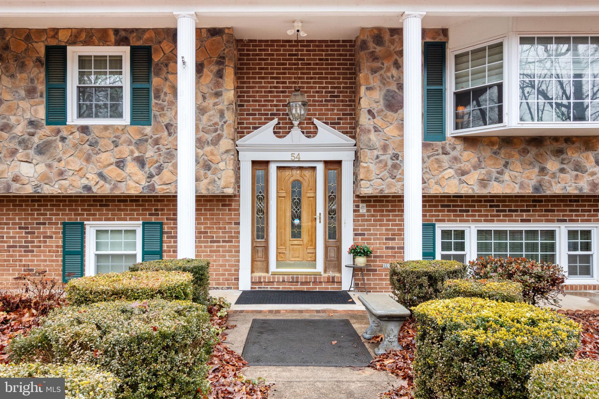 54 Richards Ferry Road Fredericksburg, VA 22406 - Photo 3 of 53 front view of a brick house with a large windows