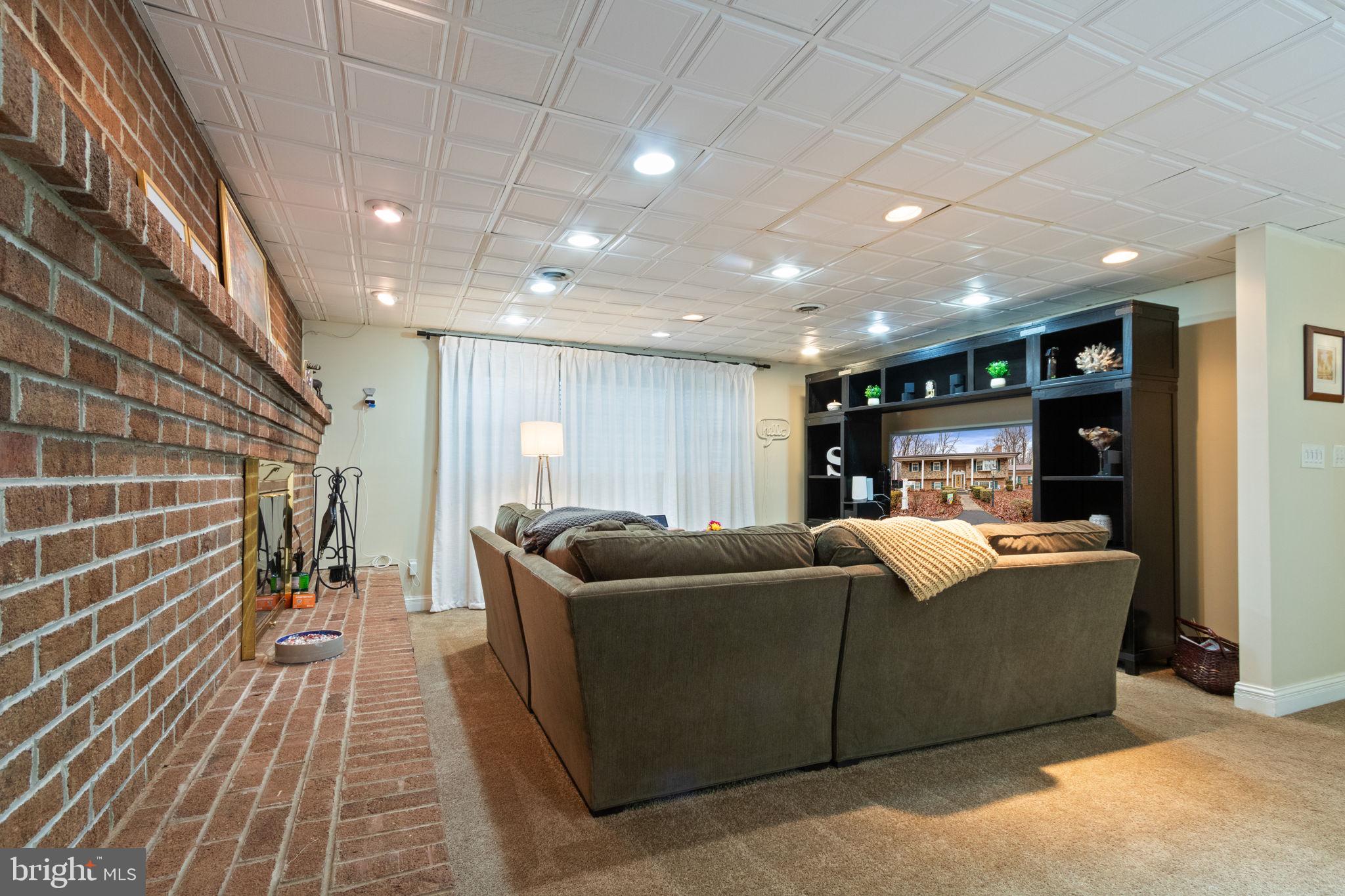 54 Richards Ferry Road Fredericksburg, VA 22406 - Photo 32 of 53 a living room with furniture and a couch