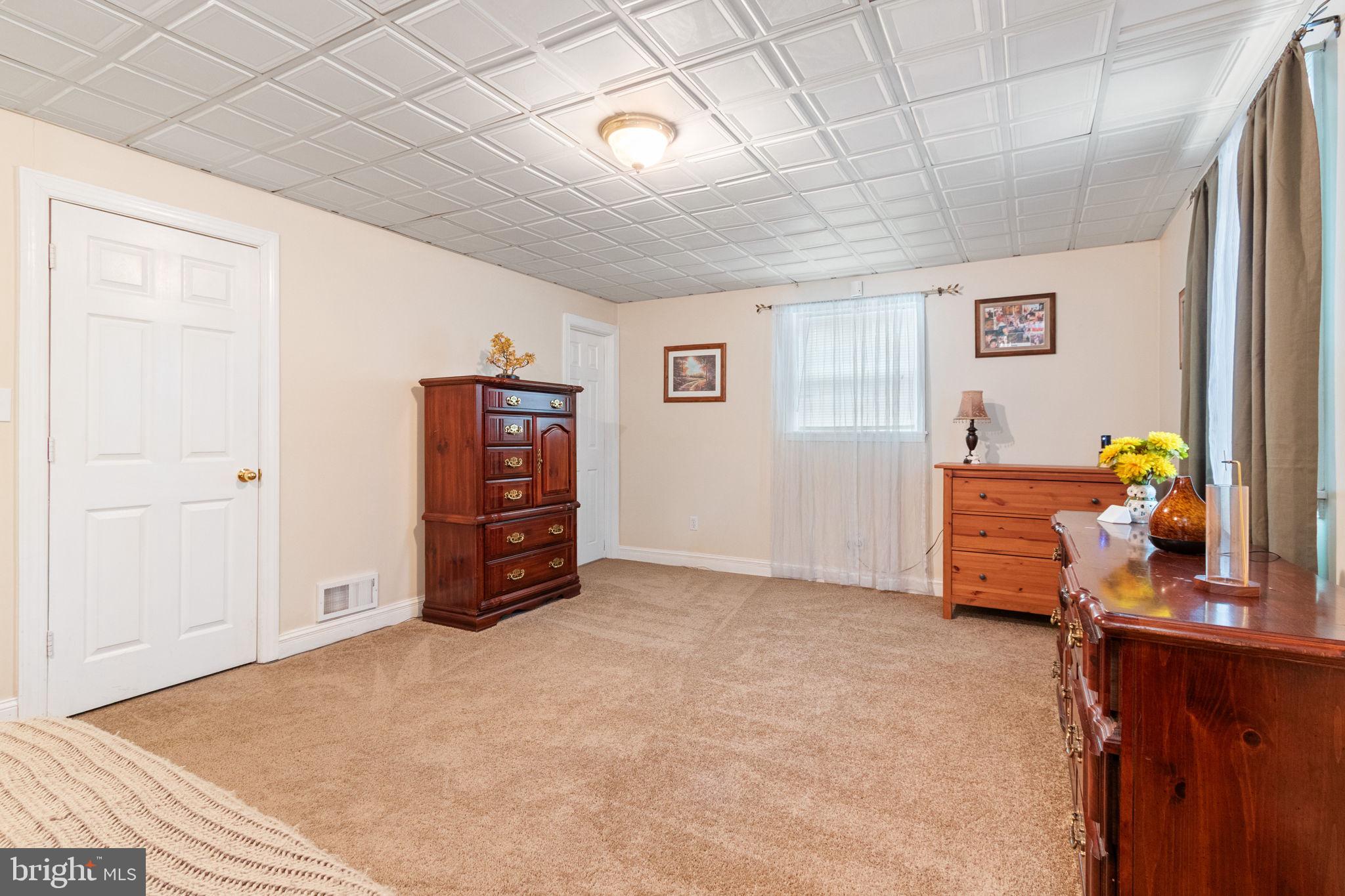54 Richards Ferry Road Fredericksburg, VA 22406 - Photo 35 of 53 a living room with furniture and a flat screen tv