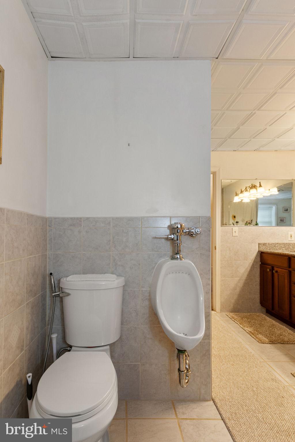 54 Richards Ferry Road Fredericksburg, VA 22406 - Photo 39 of 53 a white toilet sitting next to a bathroom sink