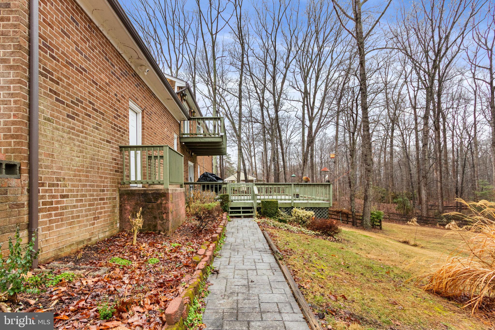 54 Richards Ferry Road Fredericksburg, VA 22406 - Photo 46 of 53 a backyard of a house with table and chairs