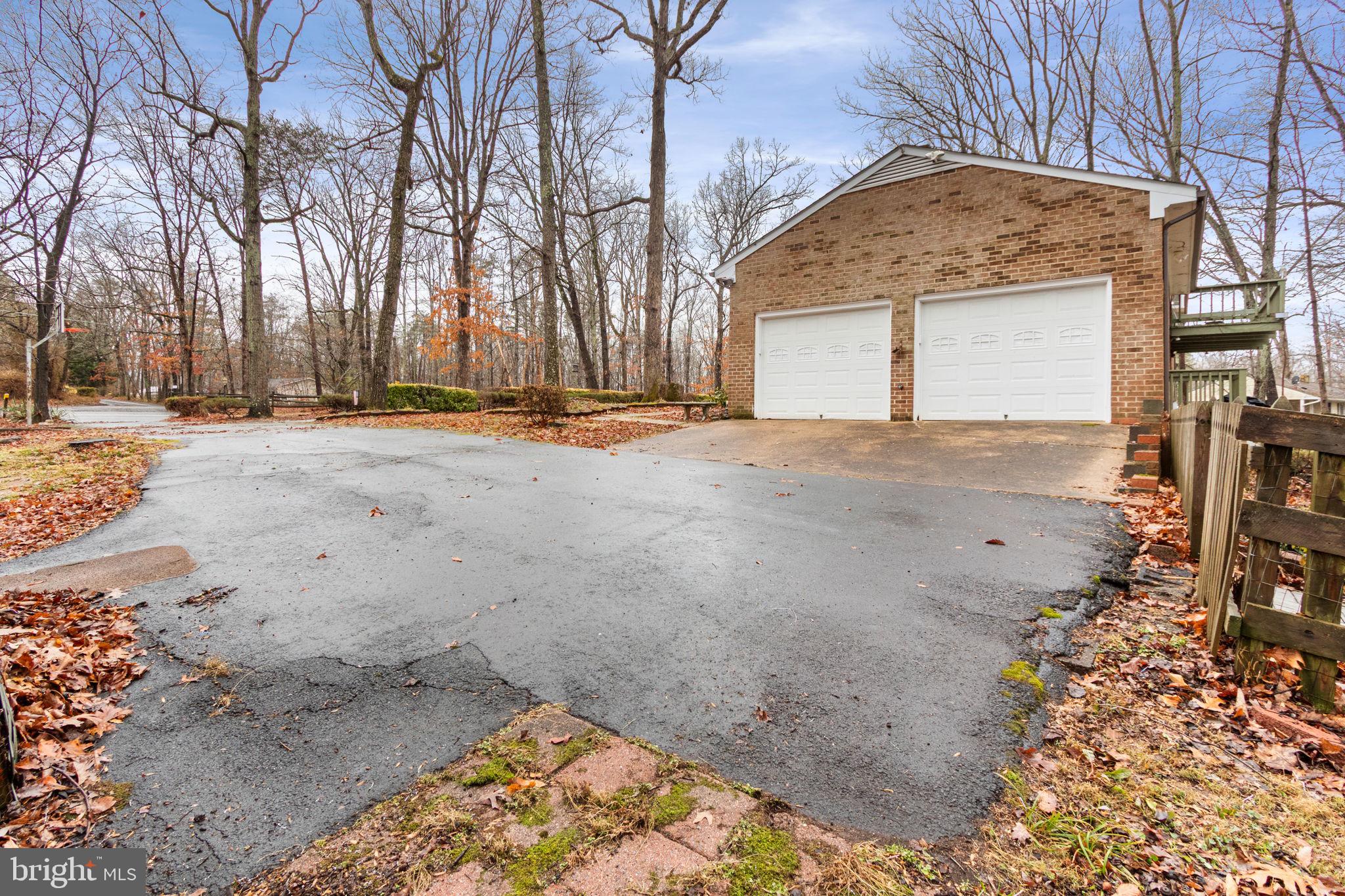 54 Richards Ferry Road Fredericksburg, VA 22406 - Photo 49 of 53 a view of a house with a yard and garage