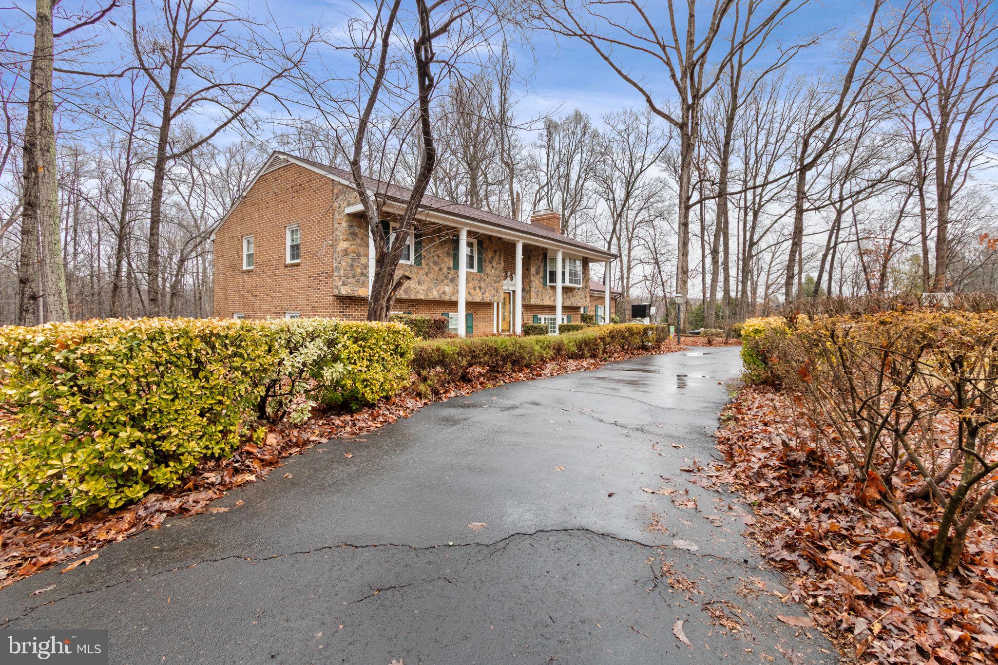 54 Richards Ferry Road Fredericksburg, VA 22406 - Photo 5 of 53 a front view of a house with a yard and garage