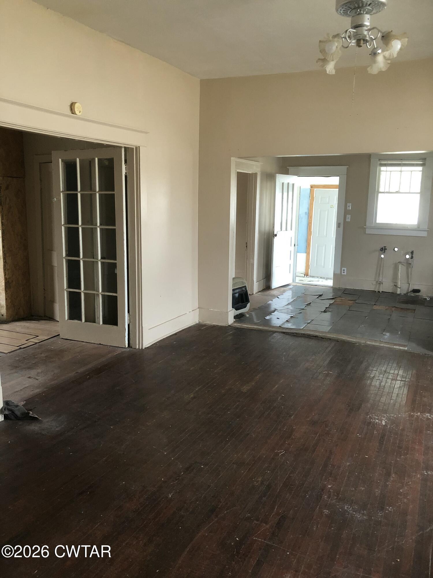 126 McCorry Street Jackson, TN 38301 - Photo 6 of 8 a view of an empty room with a window