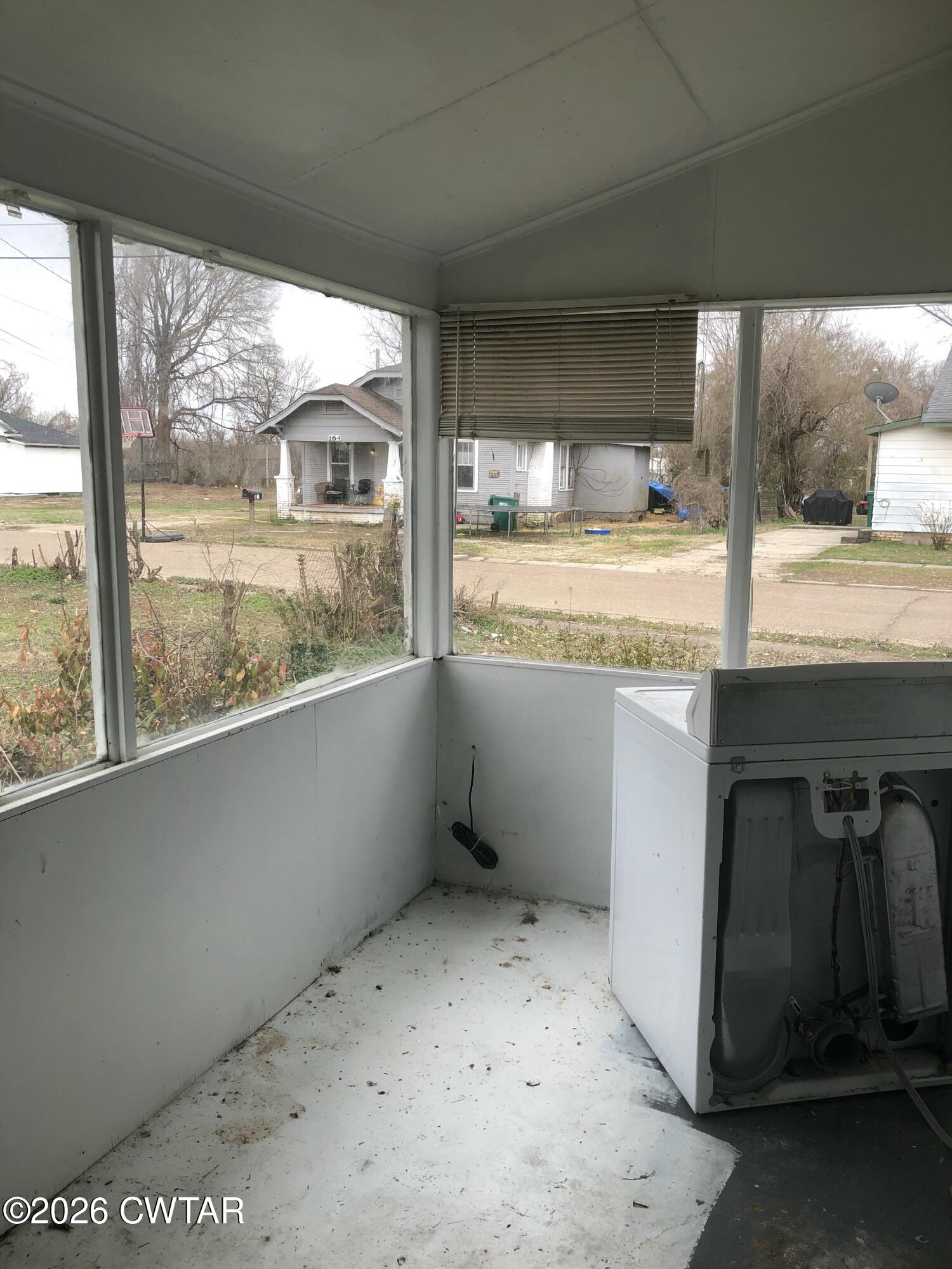 126 McCorry Street Jackson, TN 38301 - Photo 8 of 8 a view of a kitchen with a sink and a large window