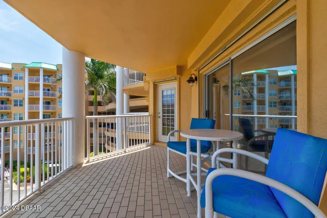 a view of a balcony with city view