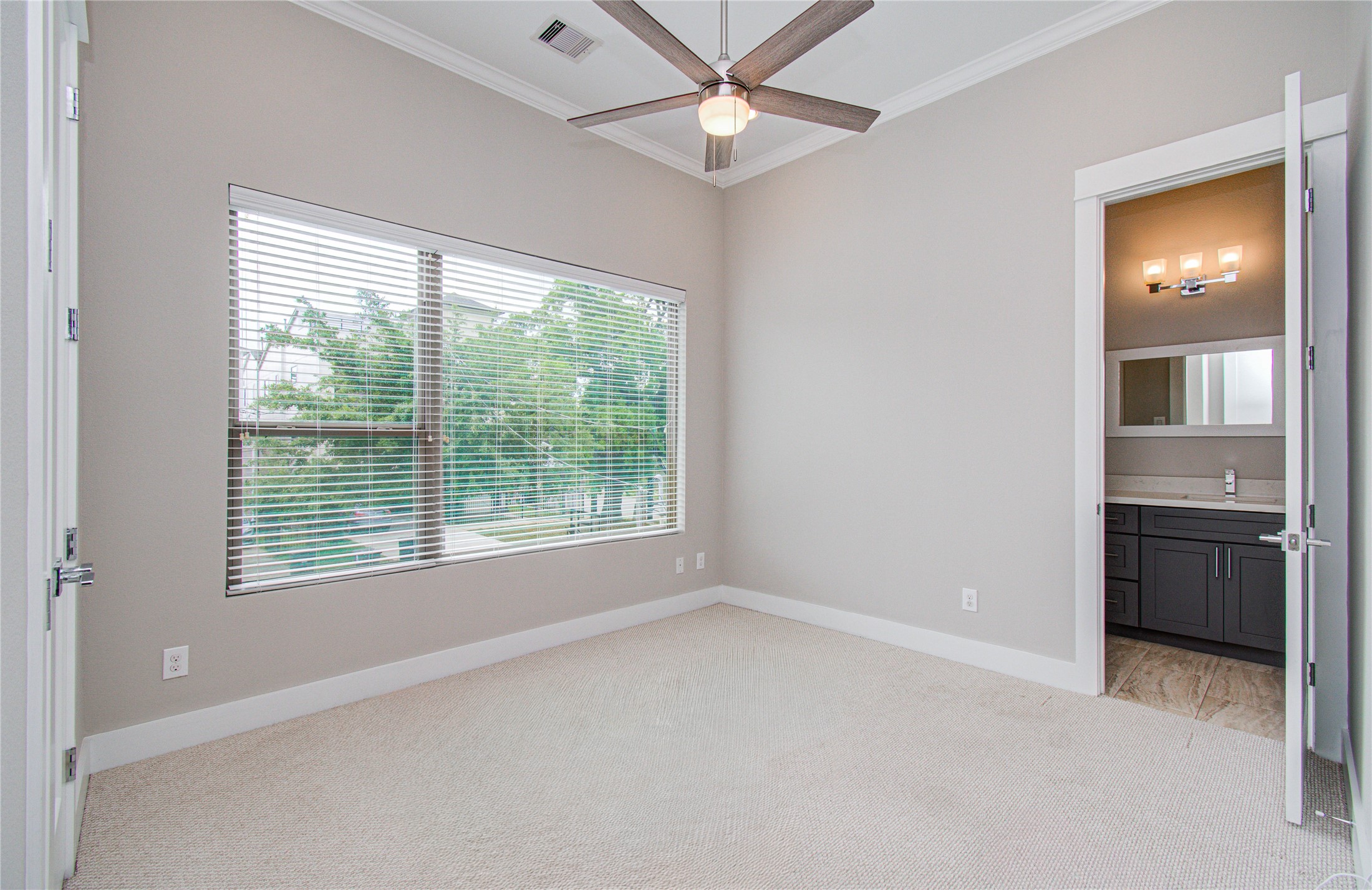 3516 Bastrop Street Houston, TX 77004 - Photo 20 of 25 a view of an empty room with a kitchen and a window