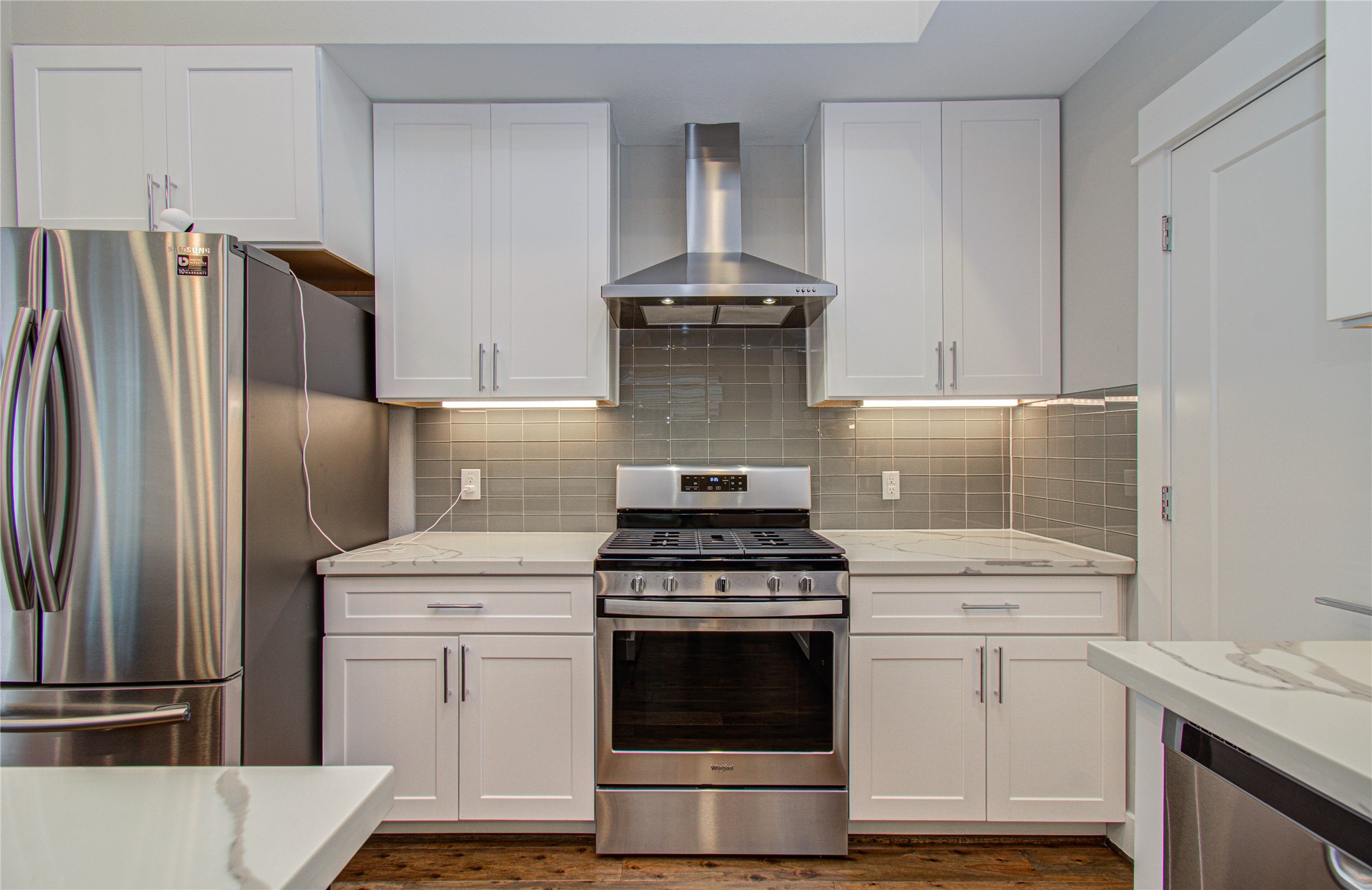 3516 Bastrop Street Houston, TX 77004 - Photo 6 of 25 a kitchen with cabinets and stainless steel appliances