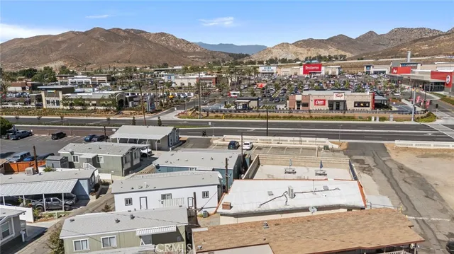 an aerial view of residential building with parking space