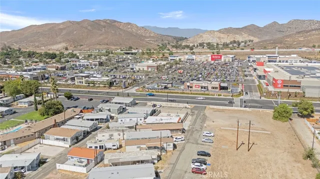 an aerial view of residential houses and city view