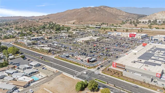 a terrace with outdoor seating and city view