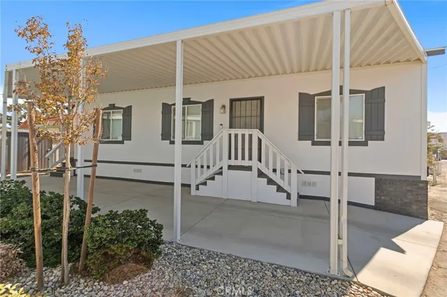 a view of a house with a street