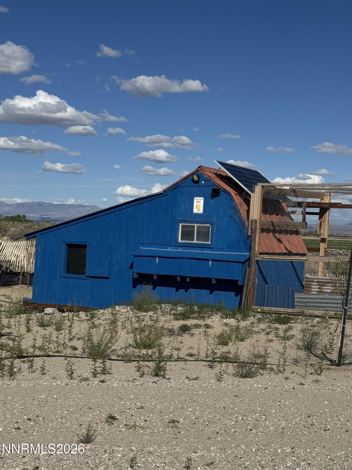 7533 Sandhill Road Fallon, NV 89406 - Photo 21 of 22 a view of a backyard of the house