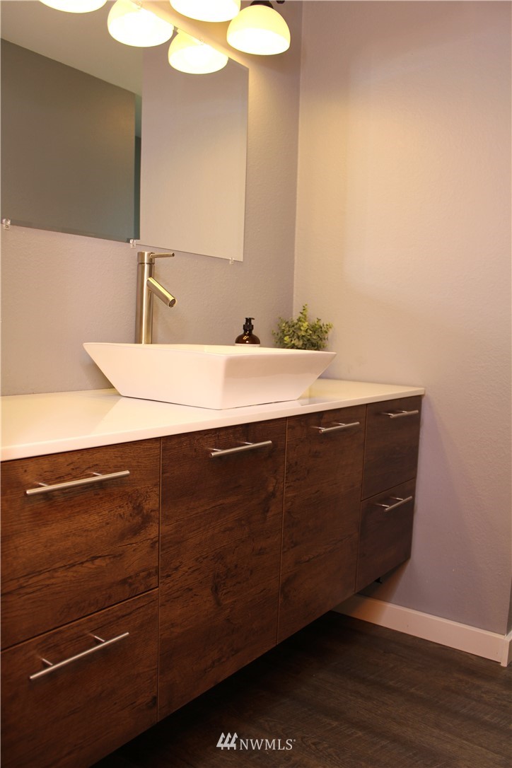 709 222nd Street Southwest Bothell, WA 98021 - Photo 13 of 38 a room with a sink and a mirror