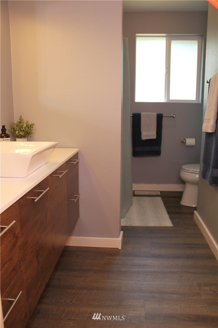 709 222nd Street Southwest Bothell, WA 98021 - Photo 14 of 38 a view of bathroom with a sink and a toilet