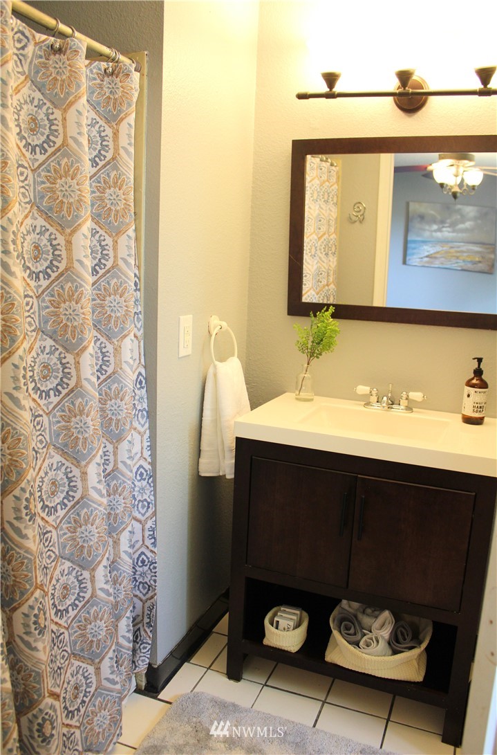 709 222nd Street Southwest Bothell, WA 98021 - Photo 20 of 38 a bathroom with a sink and a mirror