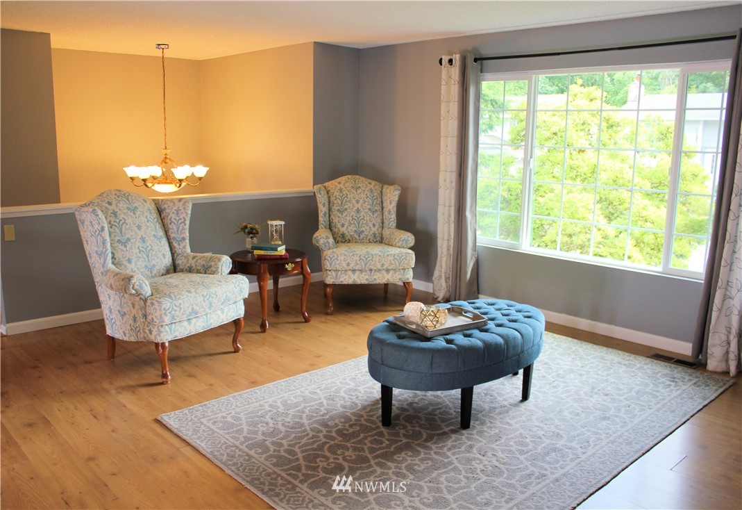 709 222nd Street Southwest Bothell, WA 98021 - Photo 3 of 38 a living room with furniture and a large window