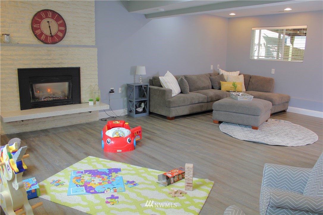 709 222nd Street Southwest Bothell, WA 98021 - Photo 23 of 38 a living room with furniture and a couch