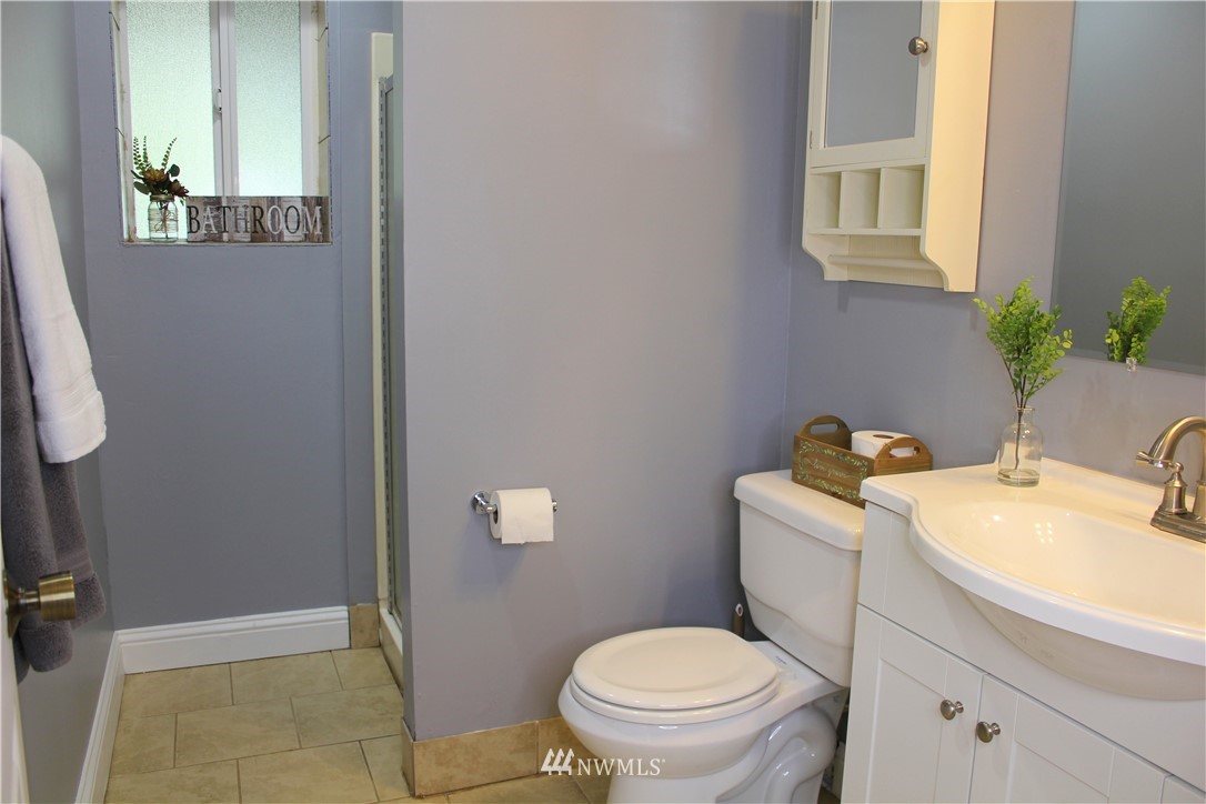 709 222nd Street Southwest Bothell, WA 98021 - Photo 25 of 38 a bathroom with a sink and toilet