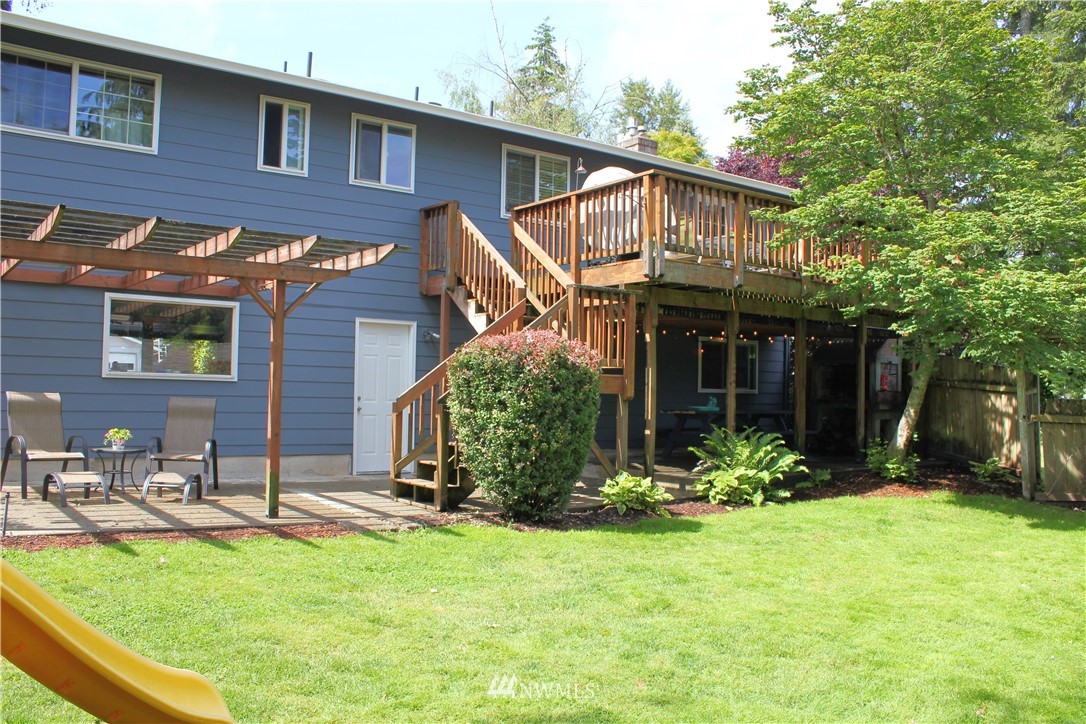 709 222nd Street Southwest Bothell, WA 98021 - Photo 29 of 38 a view of a house with yard and sitting area