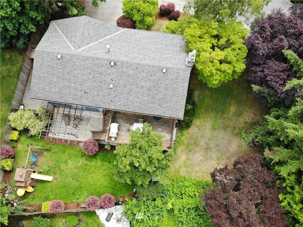 709 222nd Street Southwest Bothell, WA 98021 - Photo 33 of 38 a aerial view of a house with a yard table and chairs