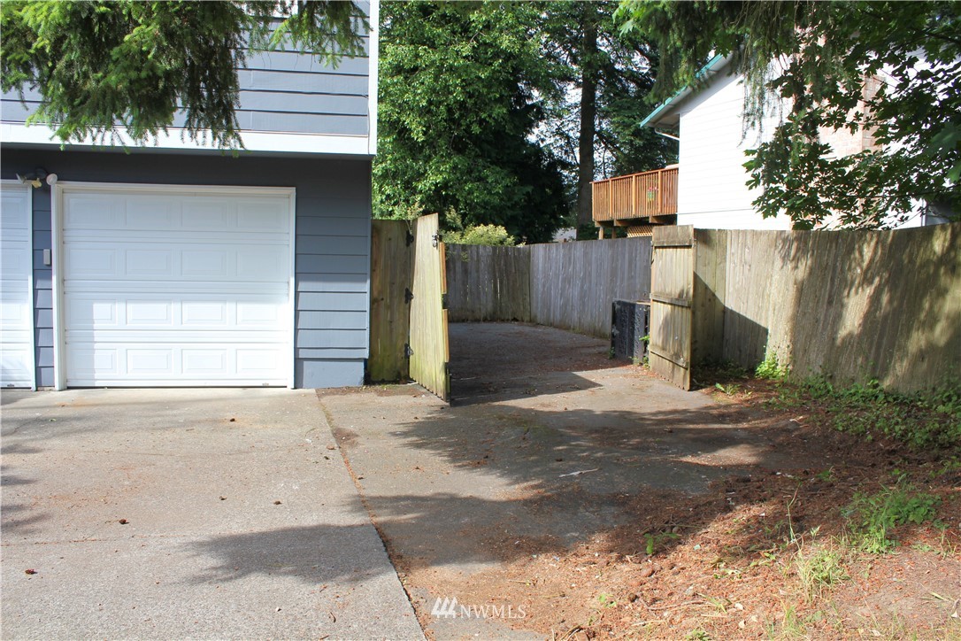 709 222nd Street Southwest Bothell, WA 98021 - Photo 34 of 38 a view of a house with a yard