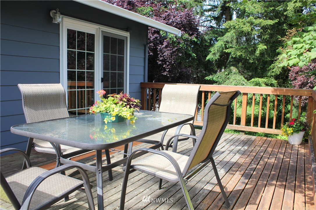 709 222nd Street Southwest Bothell, WA 98021 - Photo 9 of 38 a view of balcony with furniture and wooden deck