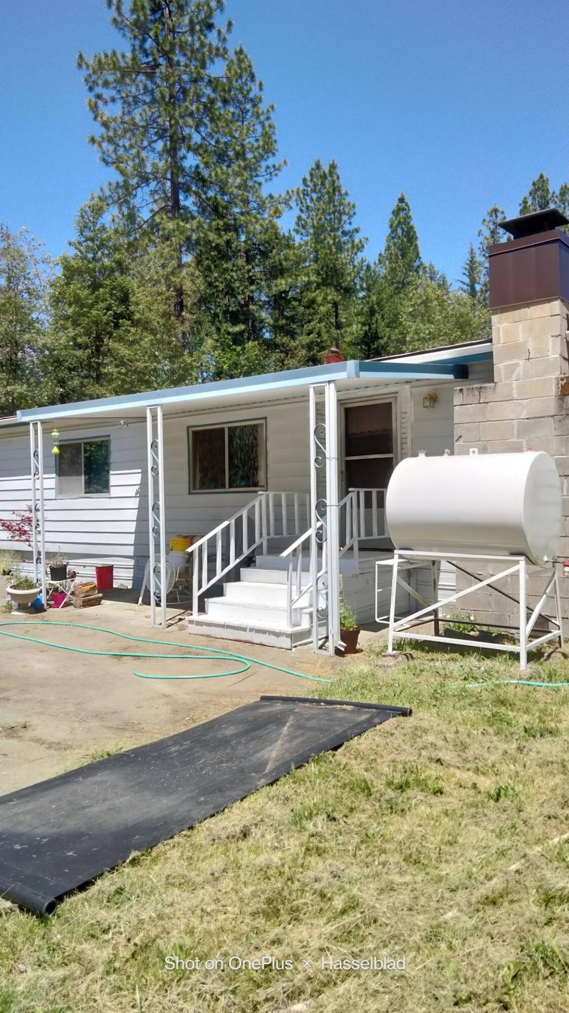 575 Kirkham Road Cave Junction, OR 97523 - Photo 9 of 45 a house view with a outdoor space