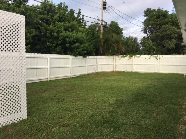 3657 Island Road Palm Beach Gardens, FL 33410 - Photo 19 of 22 Fenced Backyard