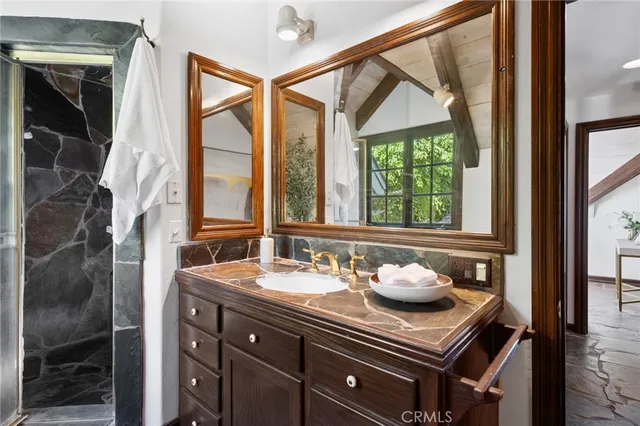a view of a livingroom with furniture window and wooden floor