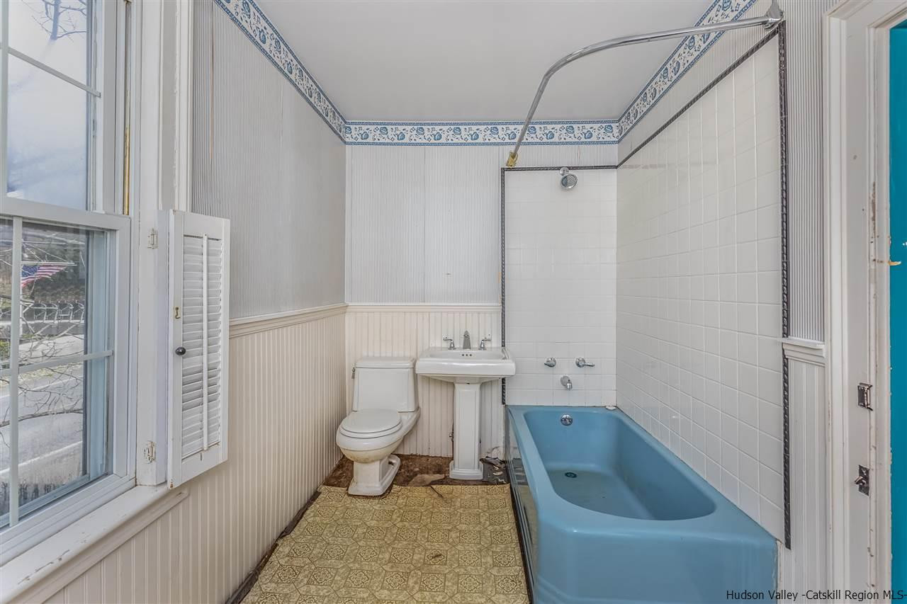 866 Hollow Road Salt Point, NY 12578 - Photo 28 of 32 a bathroom with a sink a toilet and shower