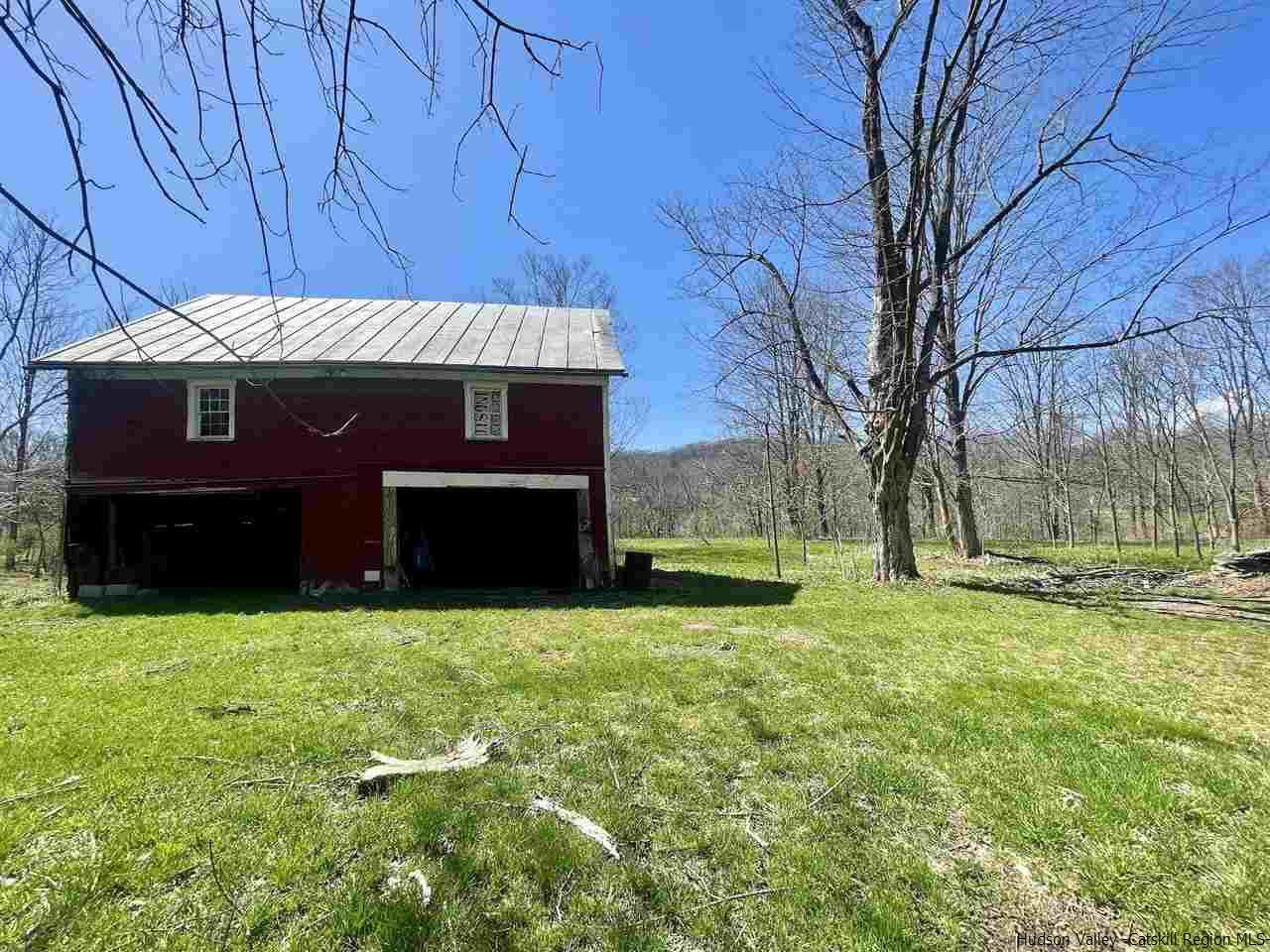 866 Hollow Road Salt Point, NY 12578 - Photo 5 of 32 a front view of house with yard and trees