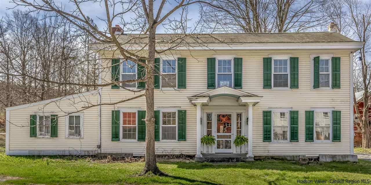 866 Hollow Road Salt Point, NY 12578 - Photo 6 of 32 front view of a house with a yard