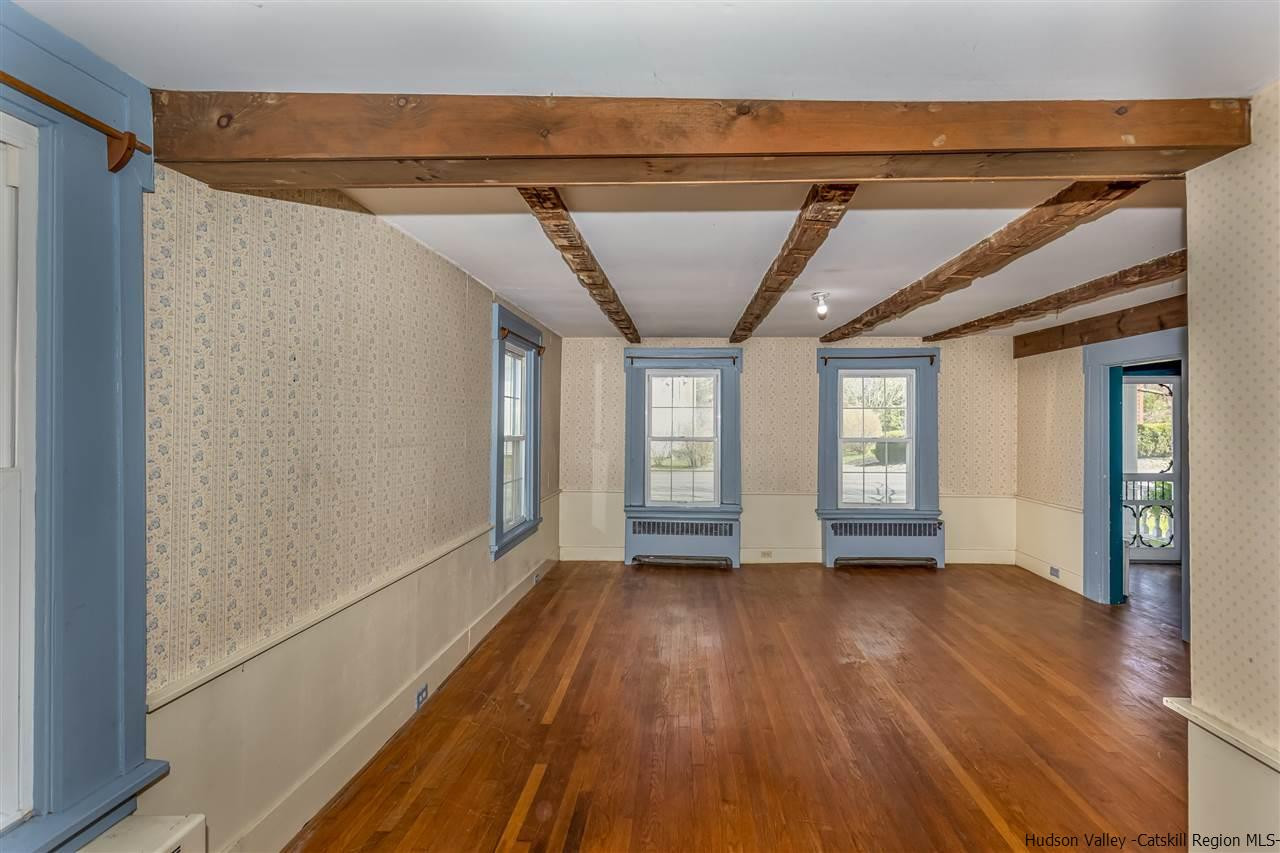 866 Hollow Road Salt Point, NY 12578 - Photo 10 of 32 a view of hallway with window and wooden floor