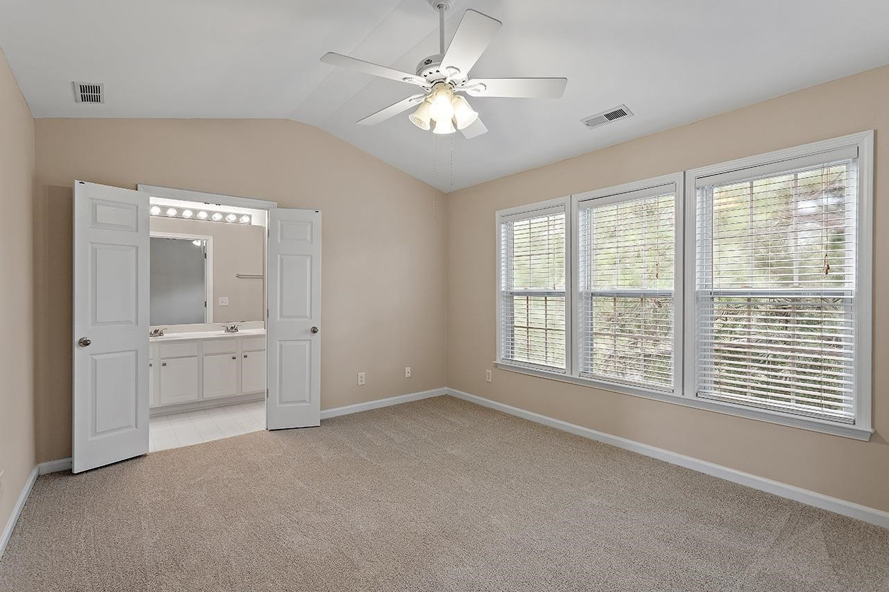 7001 Wheat Mill Place Raleigh, NC 27613 - Photo 21 of 32 Primary Bedroom
