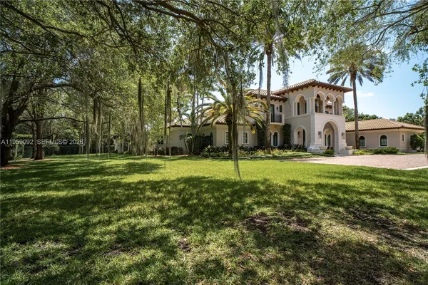 a house view with a garden space