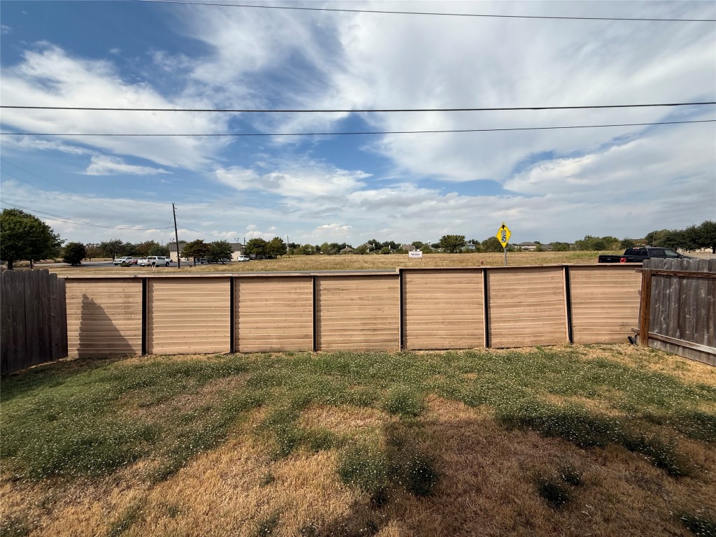 12110 Corsicana Trail, Unit 19B Manor, TX 78653 - Photo 19 of 23 View of yard