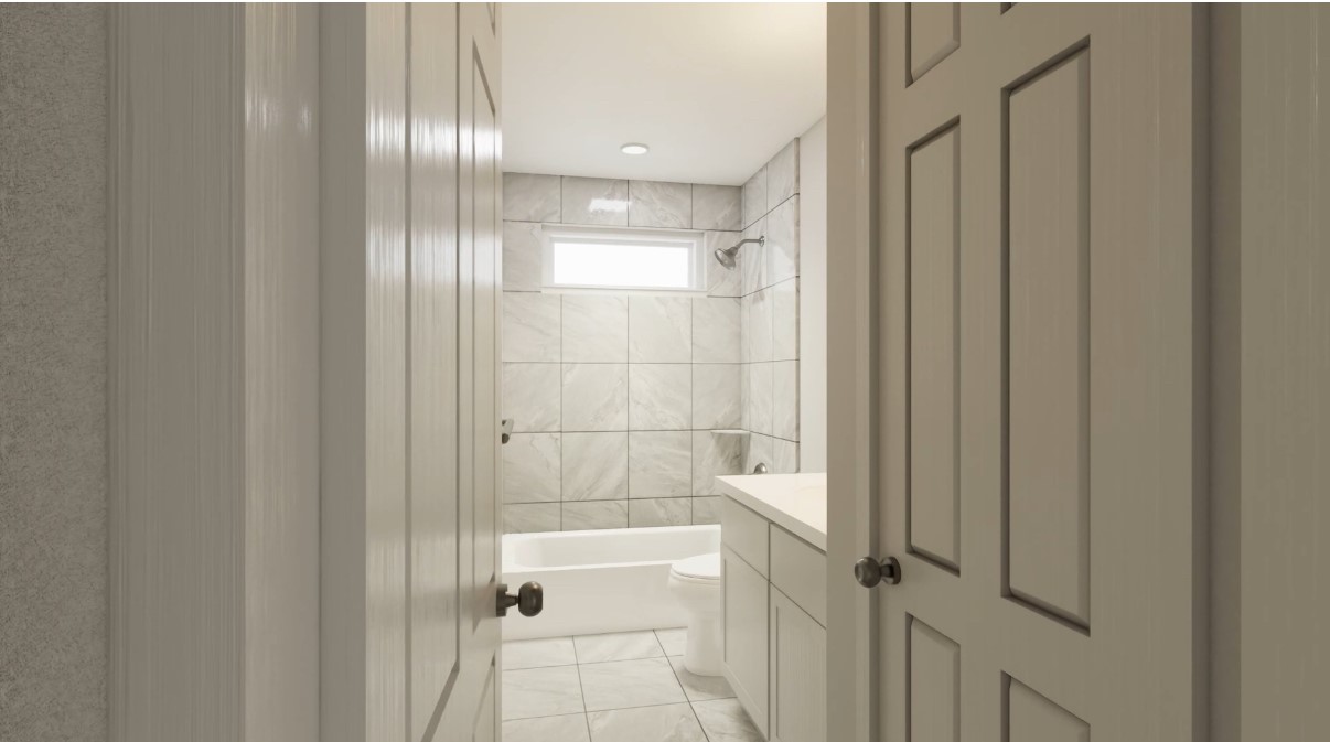 12110 Corsicana Trail, Unit 19B Manor, TX 78653 - Photo 2 of 23 Bathroom with vanity and washtub / shower combination