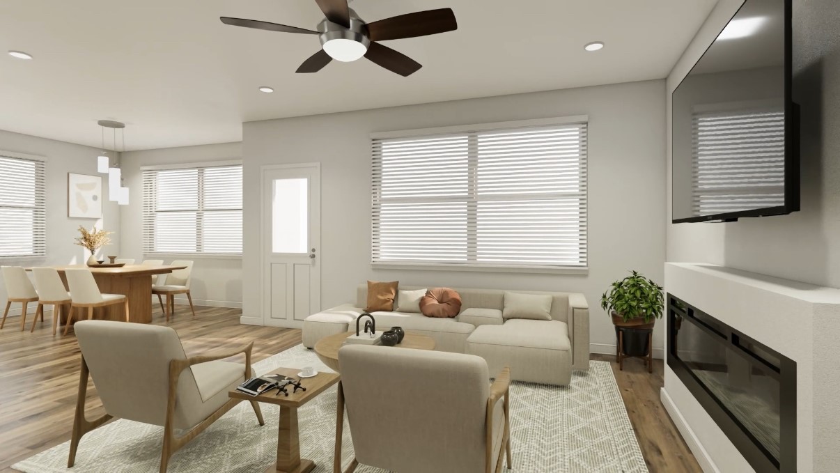 12110 Corsicana Trail, Unit 19B Manor, TX 78653 - Photo 23 of 23 Living room featuring wood finished floors, a glass covered fireplace, a ceiling fan, plenty of natural light, and recessed lighting