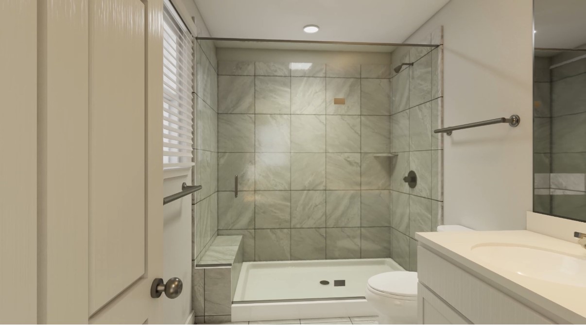 12110 Corsicana Trail, Unit 19B Manor, TX 78653 - Photo 10 of 23 Full bath with vanity and a stall shower