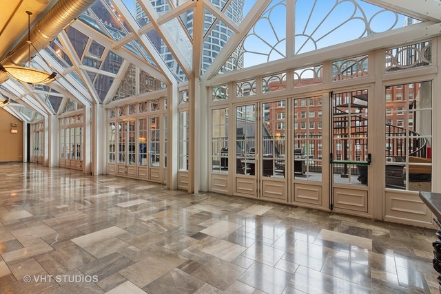 111 East Chestnut Street, Unit 43A Chicago, IL 60611 - Photo 10 of 16 a view of a building with an outdoor space