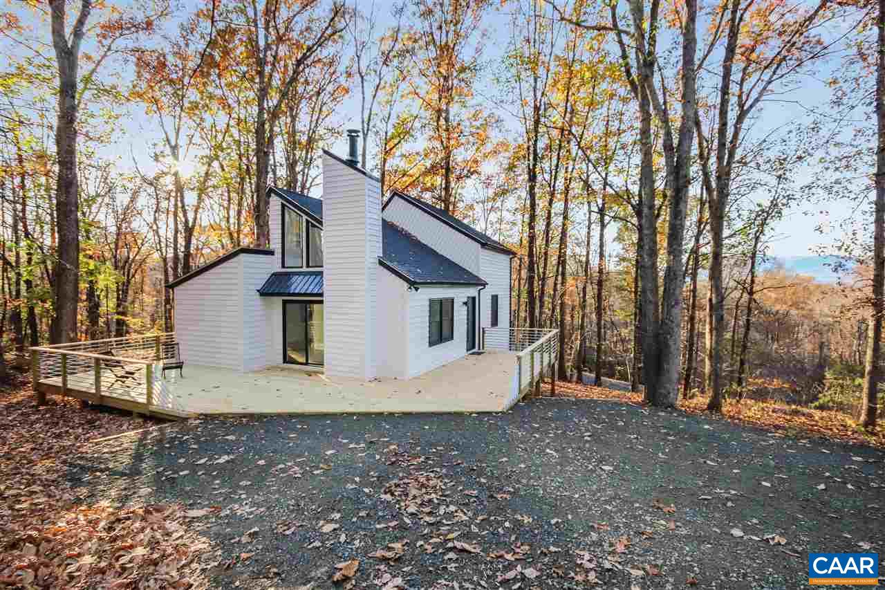 794 Dry Bridge Road Charlottesville, VA 22903 - Photo 8 of 45 a view of a house with a yard tree and a tree
