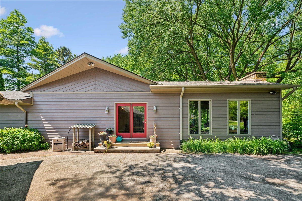 2N989 Beith Road Elburn, IL 60119 - Photo 1 of 35 a view of a house with a yard and potted plants