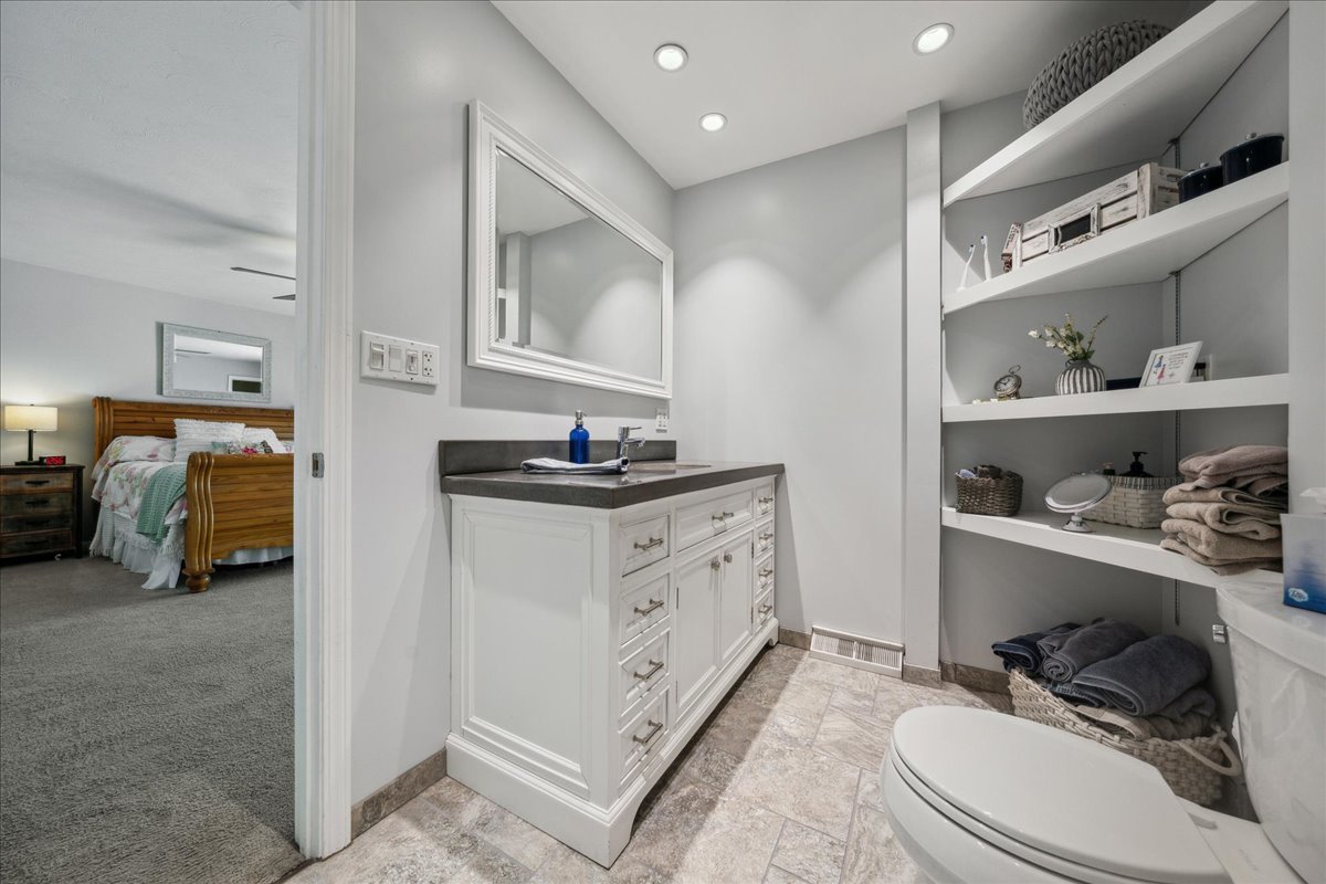 2N989 Beith Road Elburn, IL 60119 - Photo 18 of 35 a en suite bathroom with a double vanity sink and a mirror