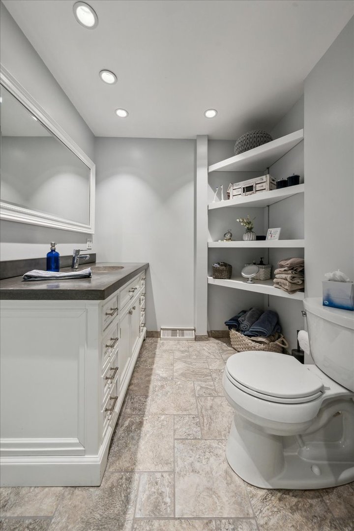 2N989 Beith Road Elburn, IL 60119 - Photo 19 of 35 a bathroom with a sink a toilet and a mirror