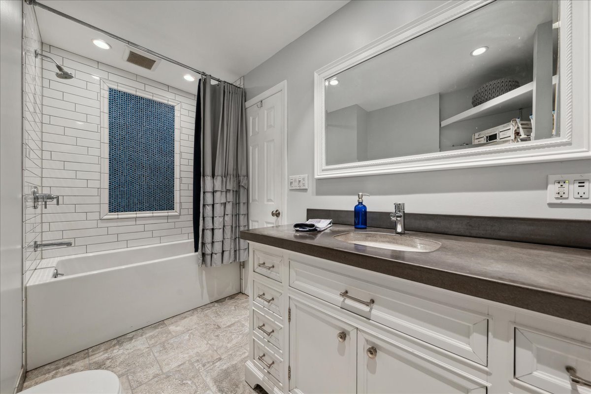 2N989 Beith Road Elburn, IL 60119 - Photo 20 of 35 a bathroom with a granite countertop sink mirror and bathtub
