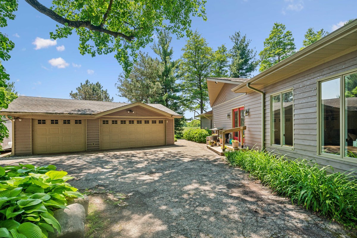 2N989 Beith Road Elburn, IL 60119 - Photo 2 of 35 a front view of a house with a yard and garage