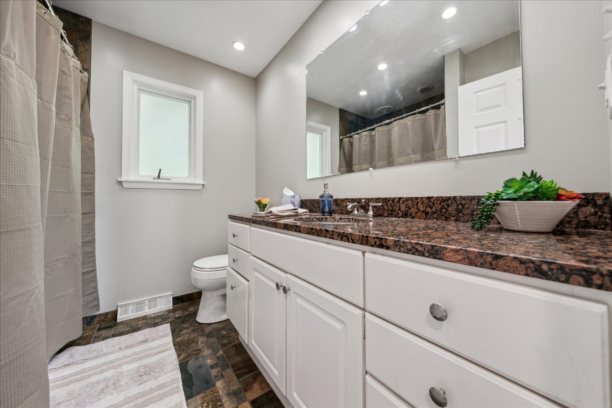 2N989 Beith Road Elburn, IL 60119 - Photo 23 of 35 a bathroom with a granite countertop sink mirror and toilet