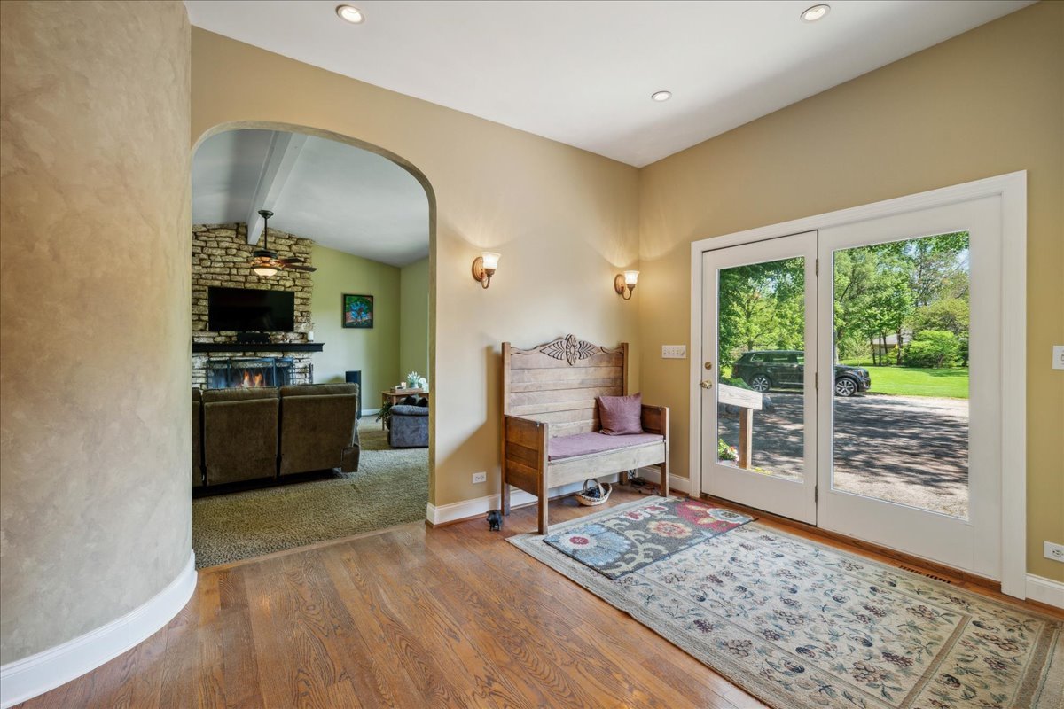 2N989 Beith Road Elburn, IL 60119 - Photo 4 of 35 a living room with furniture and a wooden floor